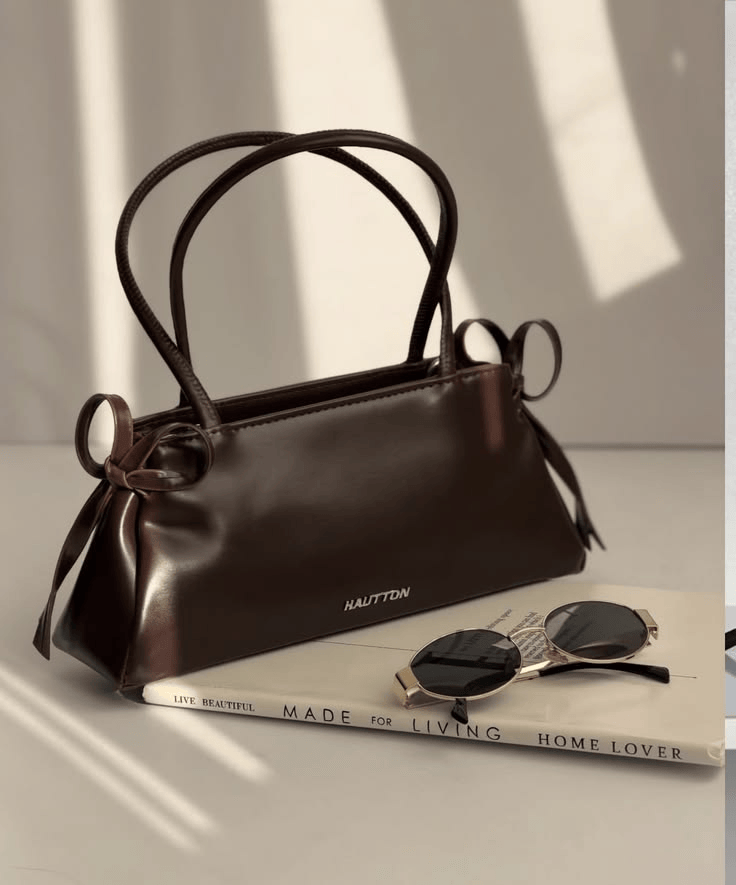 4. The East-West Shoulder Bag — Sleek, Practical, Everywhere
